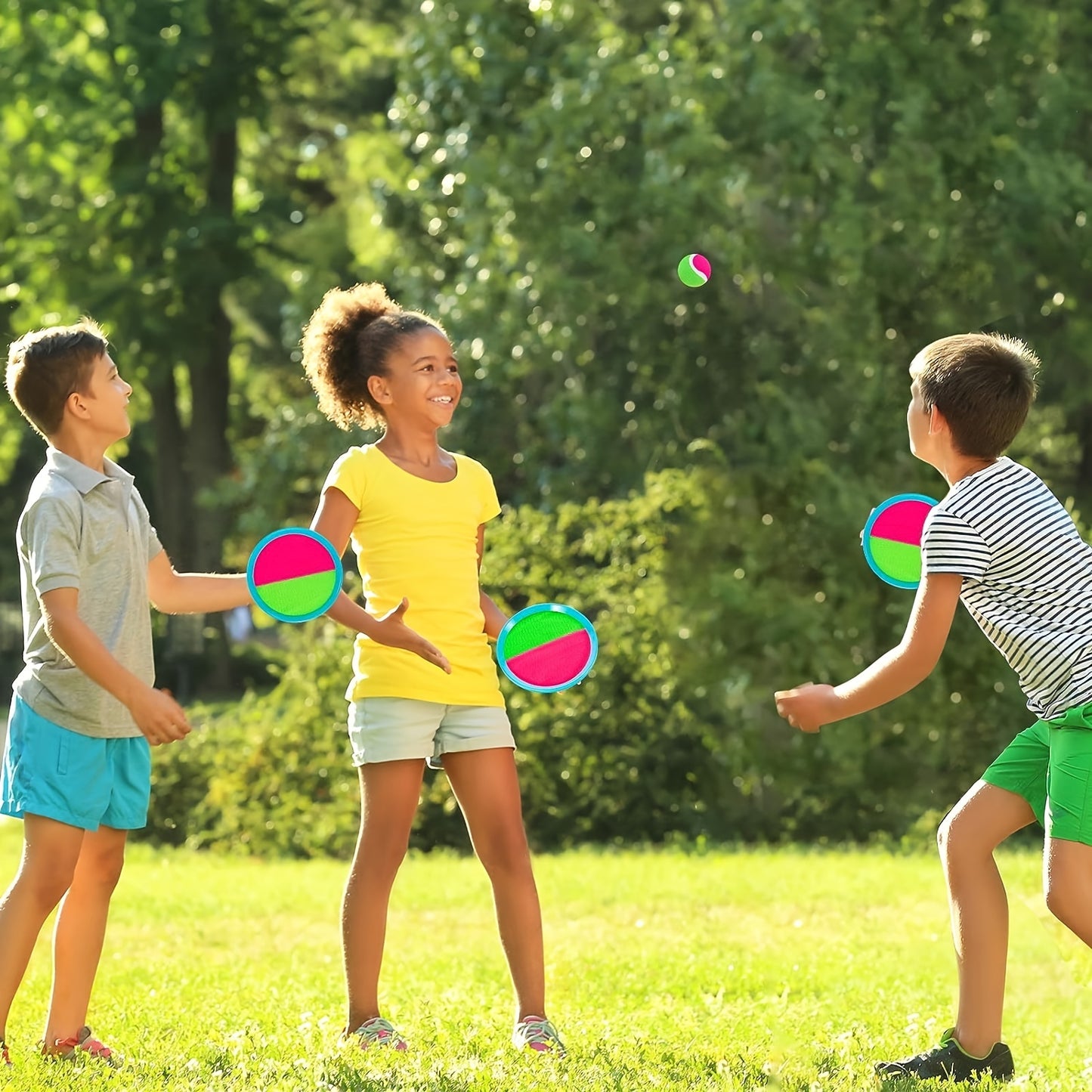 Kids' outdoor toy set includes toss and catch ball, sports racket, palm ball, and throwing sticky ball game; perfect for holiday parties and camping. Great Children's Day gift.