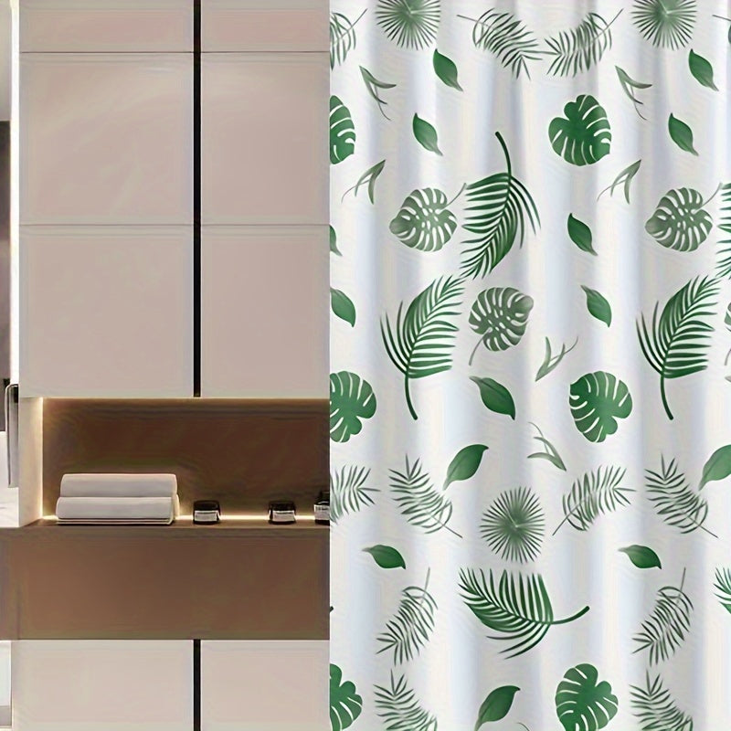 Tropical leaf bath liner made of water-resistant polyethylene, featuring a leaf pattern. Includes easy-hang white plastic hooks for all-season bathroom decor.