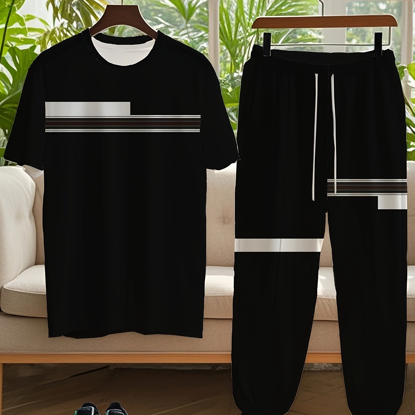 Men's casual outfit with color-blocked short-sleeve tee and drawstring pants, plus size.