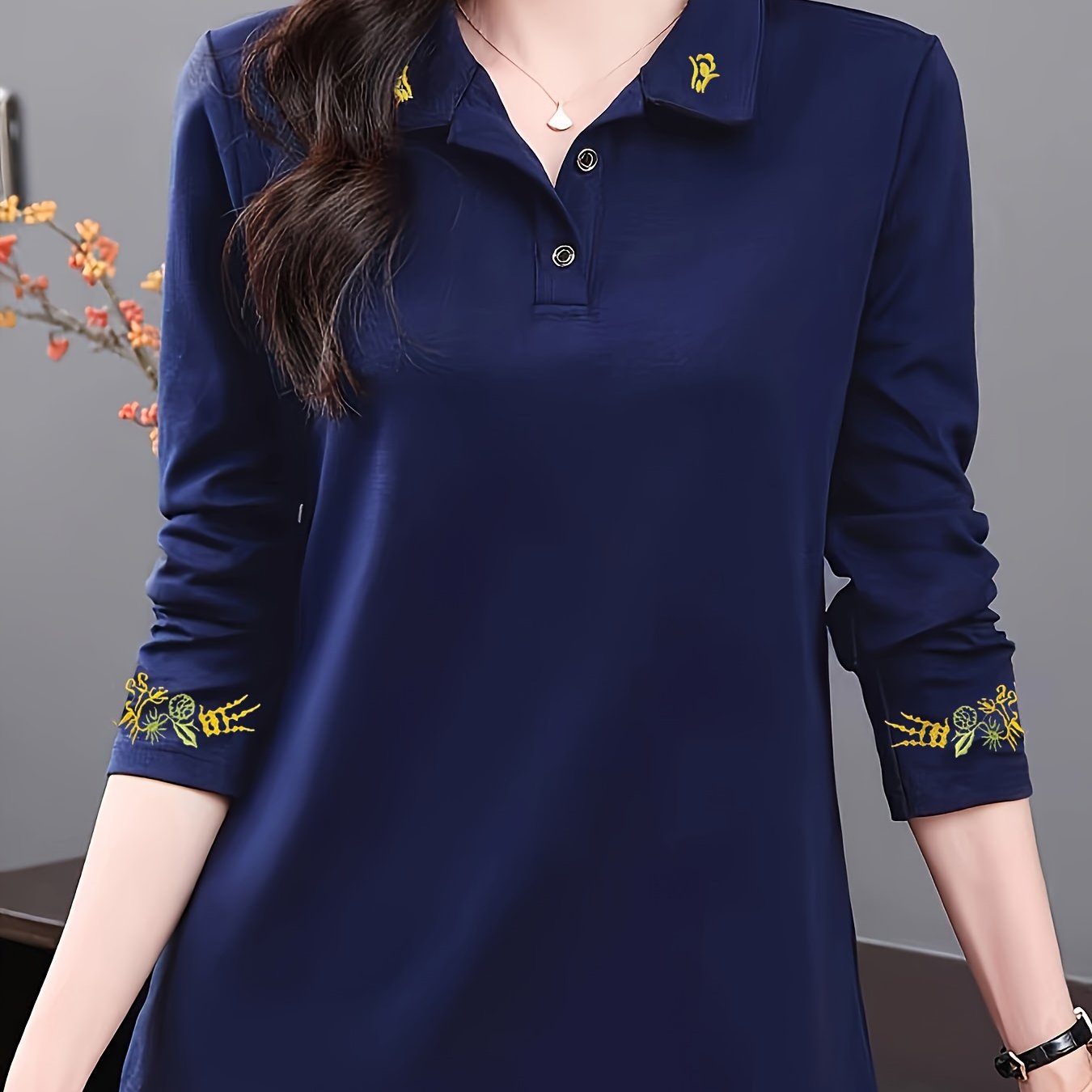 Women's stylish black long sleeve shirt with floral details - soft, comfortable, and breathable for casual wear in spring/fall.