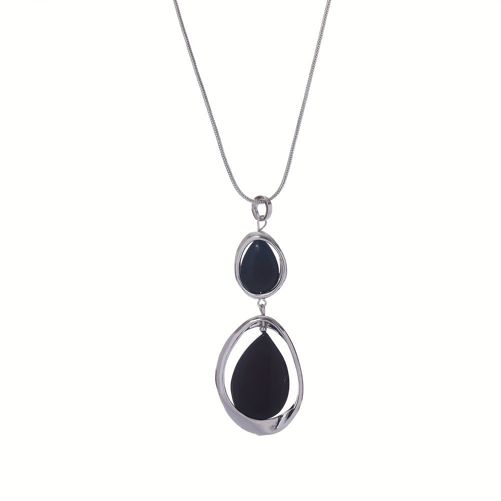 A stylish and sophisticated black stone geometric pendant necklace, perfect for women's accessories. Made from trendy zinc alloy, this long necklace is ideal for daily wear, parties, proms, vacations, and makes a great jewelry gift.