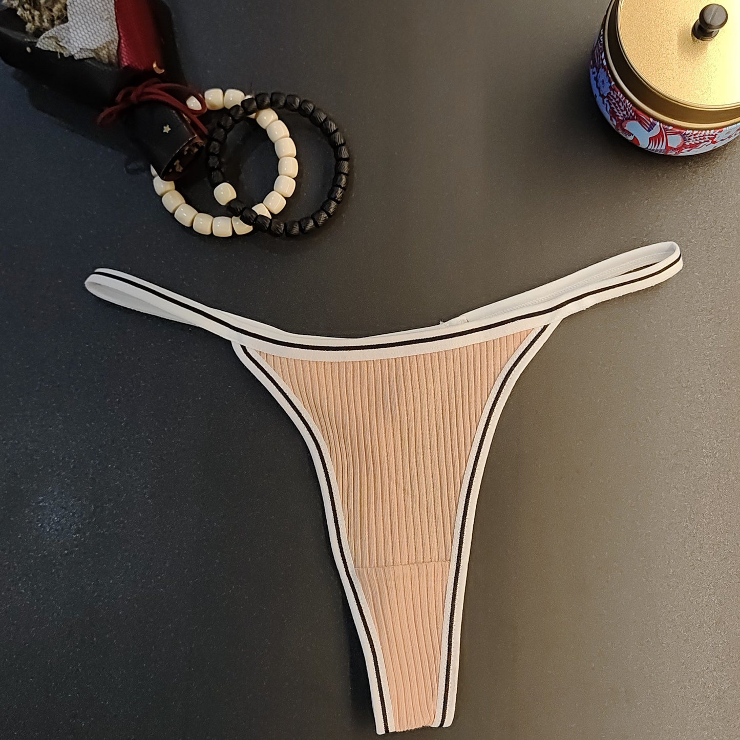 Women's low waist thongs with colorblock stripe print, perfect for sexy lingerie.