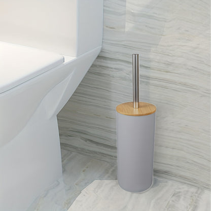 Sturdy plastic toilet brush with holder, medium firmness, portable freestanding bathroom cleaner.