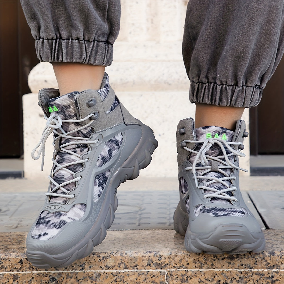 Durable high top hiking boots for men, ideal for outdoor activities.