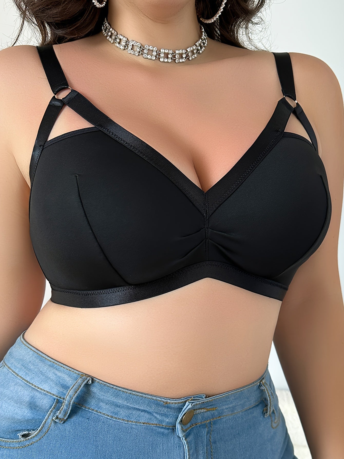 Polyester knit V-neck bralette for plus size women with medium stretch, solid color, collarless design, wire-free, and pullover style.