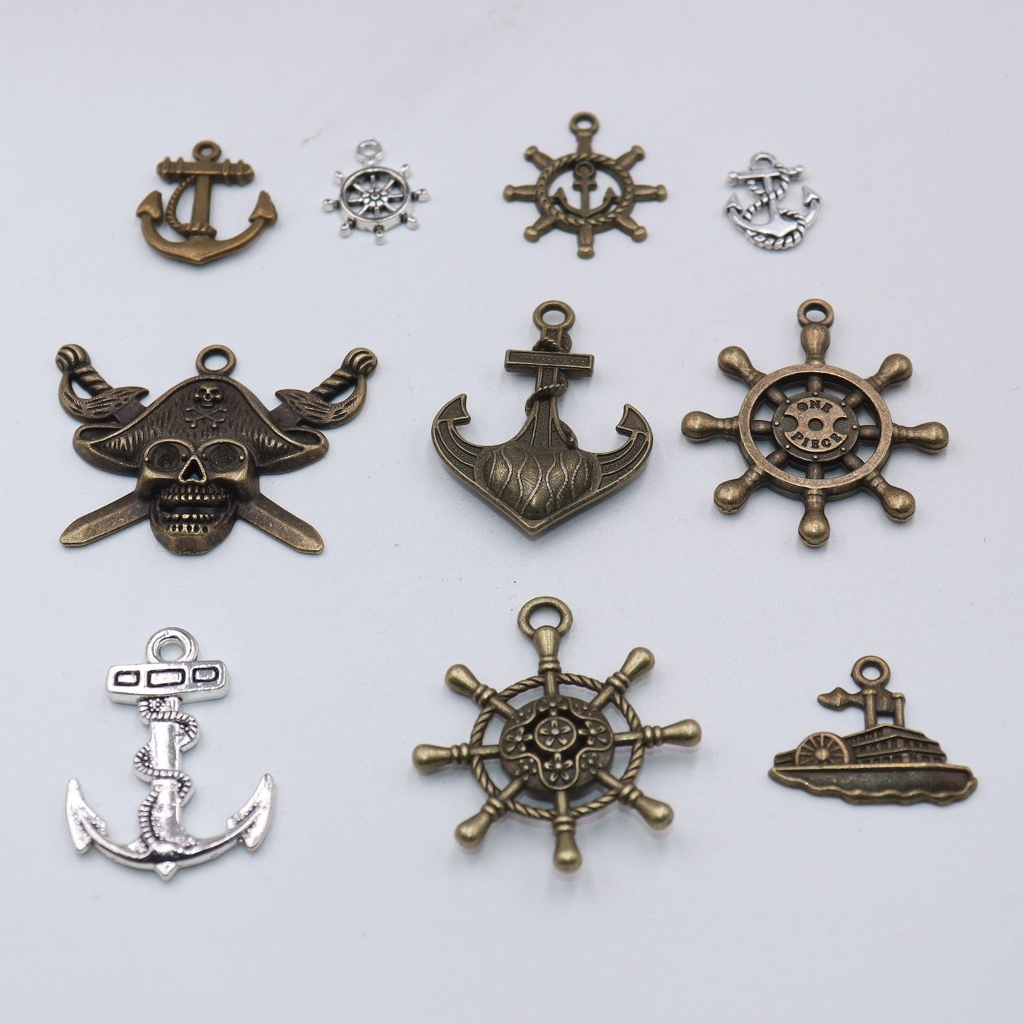 Set of 30 Assorted Pirate-themed DIY Jewelry Pendants, featuring Retro Alloy Anchor, Rudder, Compass, and Ship Wheel designs, perfect for creating Nautical Style Jewelry