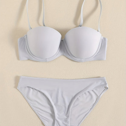 Smooth lingerie set including seamless bra, balconette bra, and bikini panties for women.