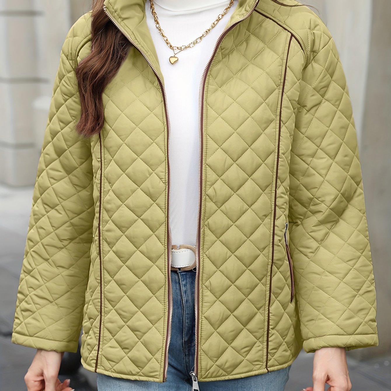 Women's plus size casual quilted outerwear with stand collar, zipper, and long sleeves. Made of 100% non-stretch solid woven polyester for fall/winter.