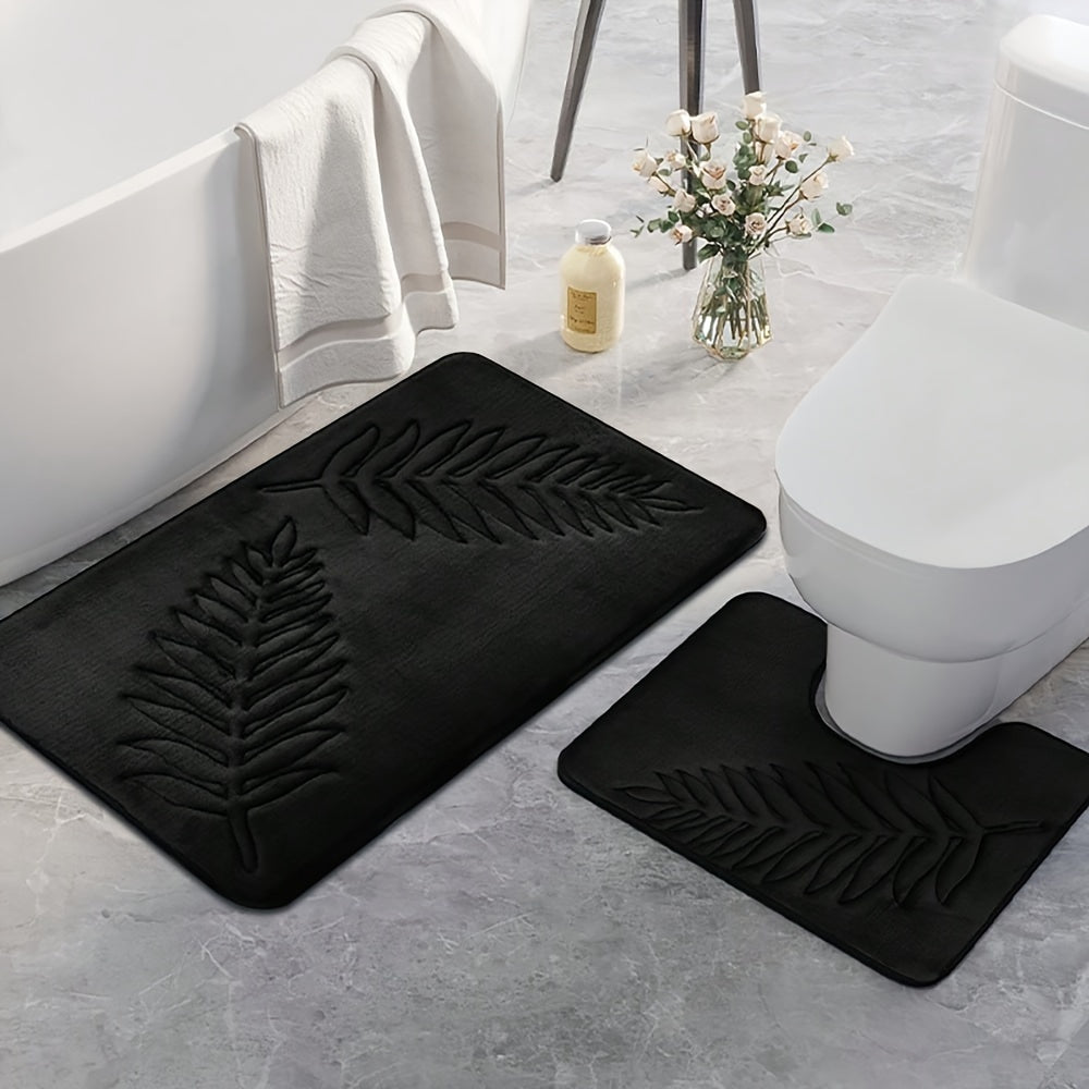 2-piece set of plush memory foam bathroom mats with a fern leaf design. These mats are non-slip, absorbent, and machine washable, making them perfect for adding a touch of style to your home decor.