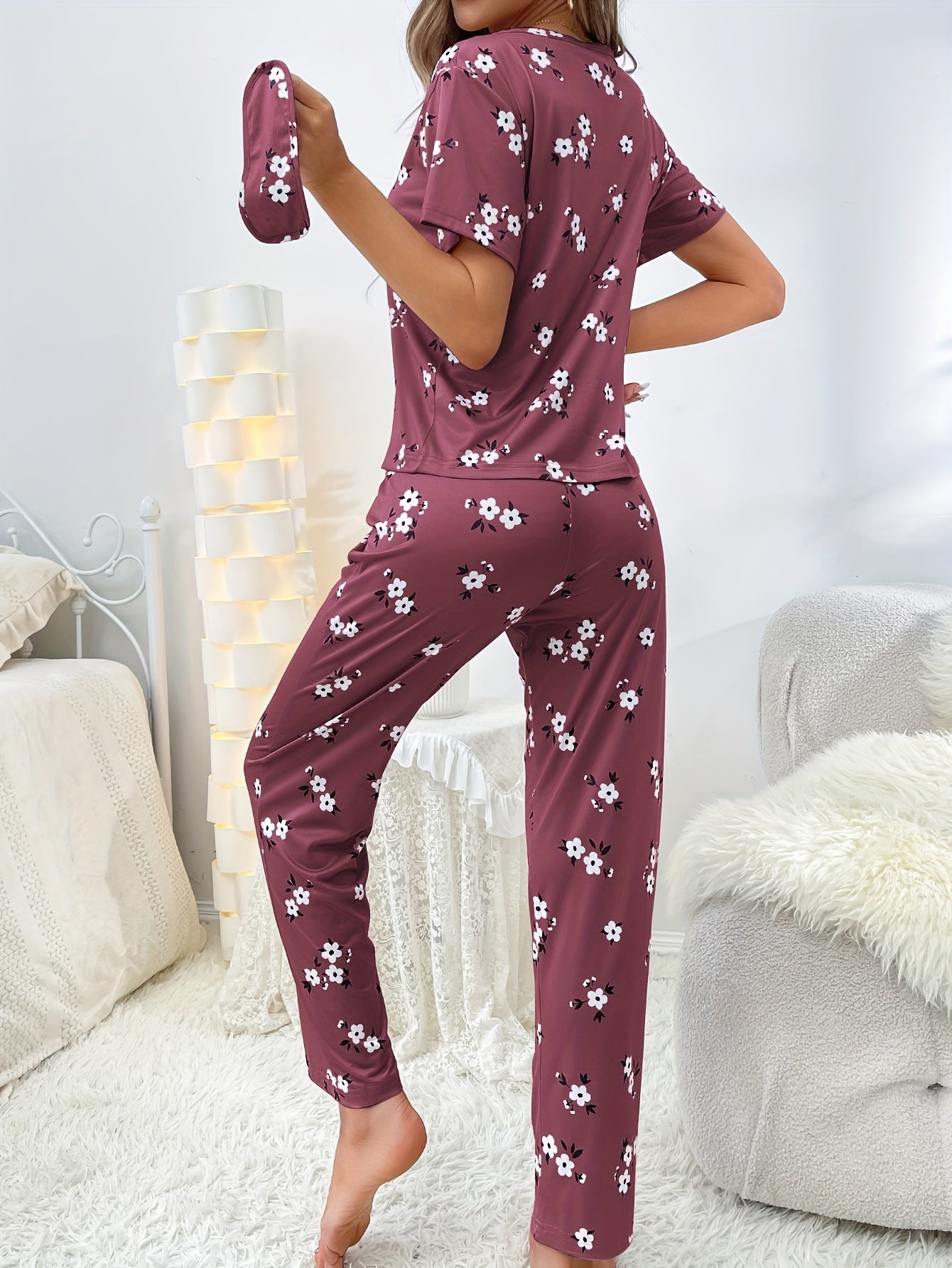 Women's sleepwear set with floral print loose pajamas, short-sleeve tee top, and pants.