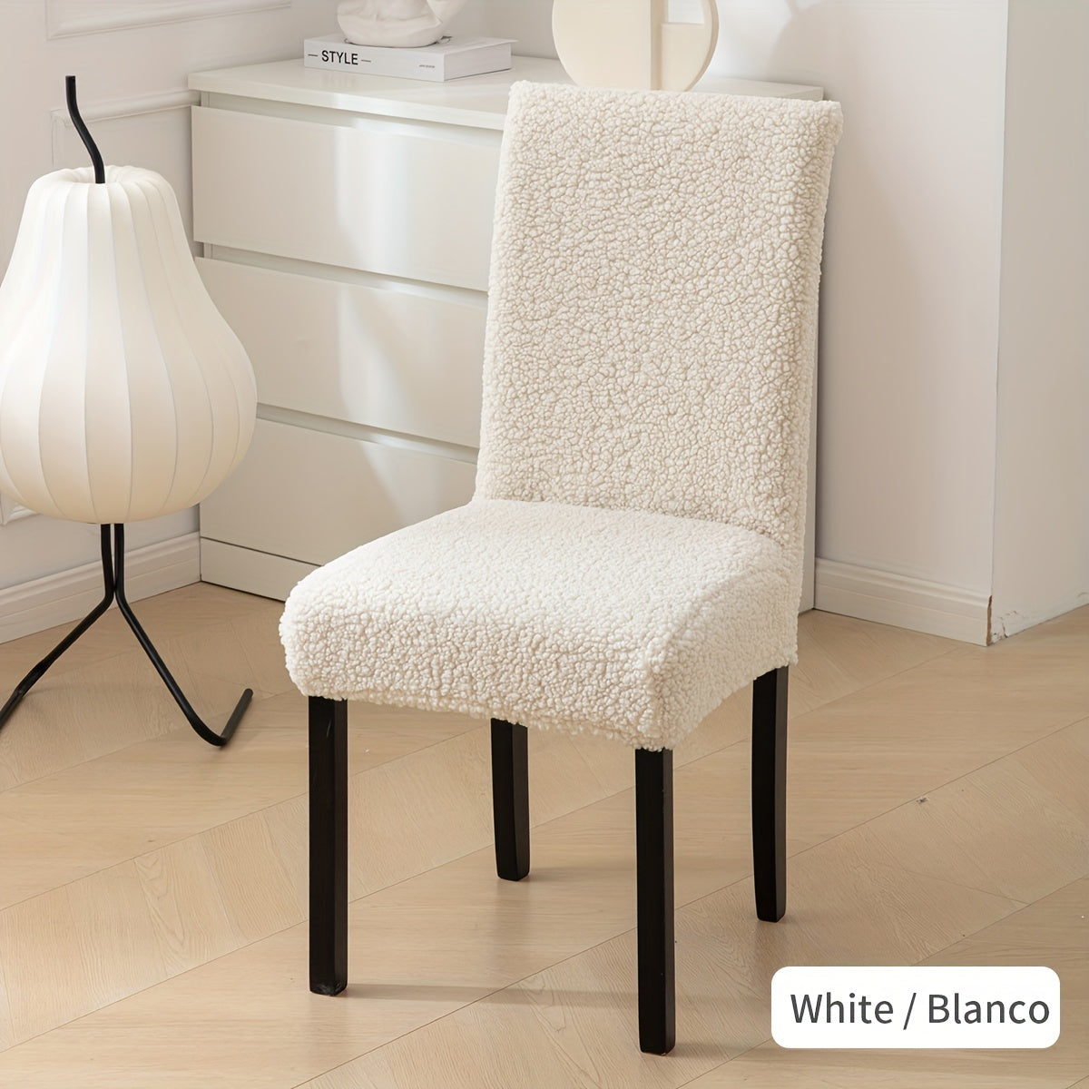 Stretch Sherpa chair cover with removable elastic slipcover, pet-friendly and machine washable. Made with a polyester and spandex blend, designed for home, restaurant, office, or banquet use. Available in multiple colors.