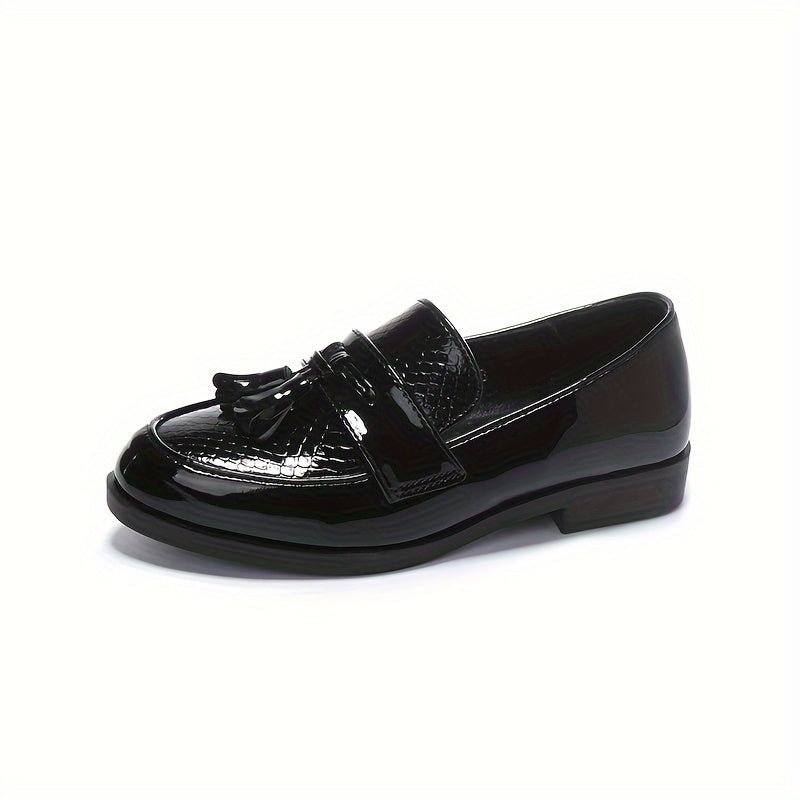 Men's casual loafers in black with non-slip TPR sole, lightweight slip-on design, tassel detail, and versatile for indoor and outdoor wear.