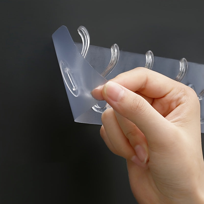 1 piece of No-Drill Row Coat Hooks, including Six-In-One and Three-In-One Transparent Adhesive Hooks for Hanging Clothes and Hats.