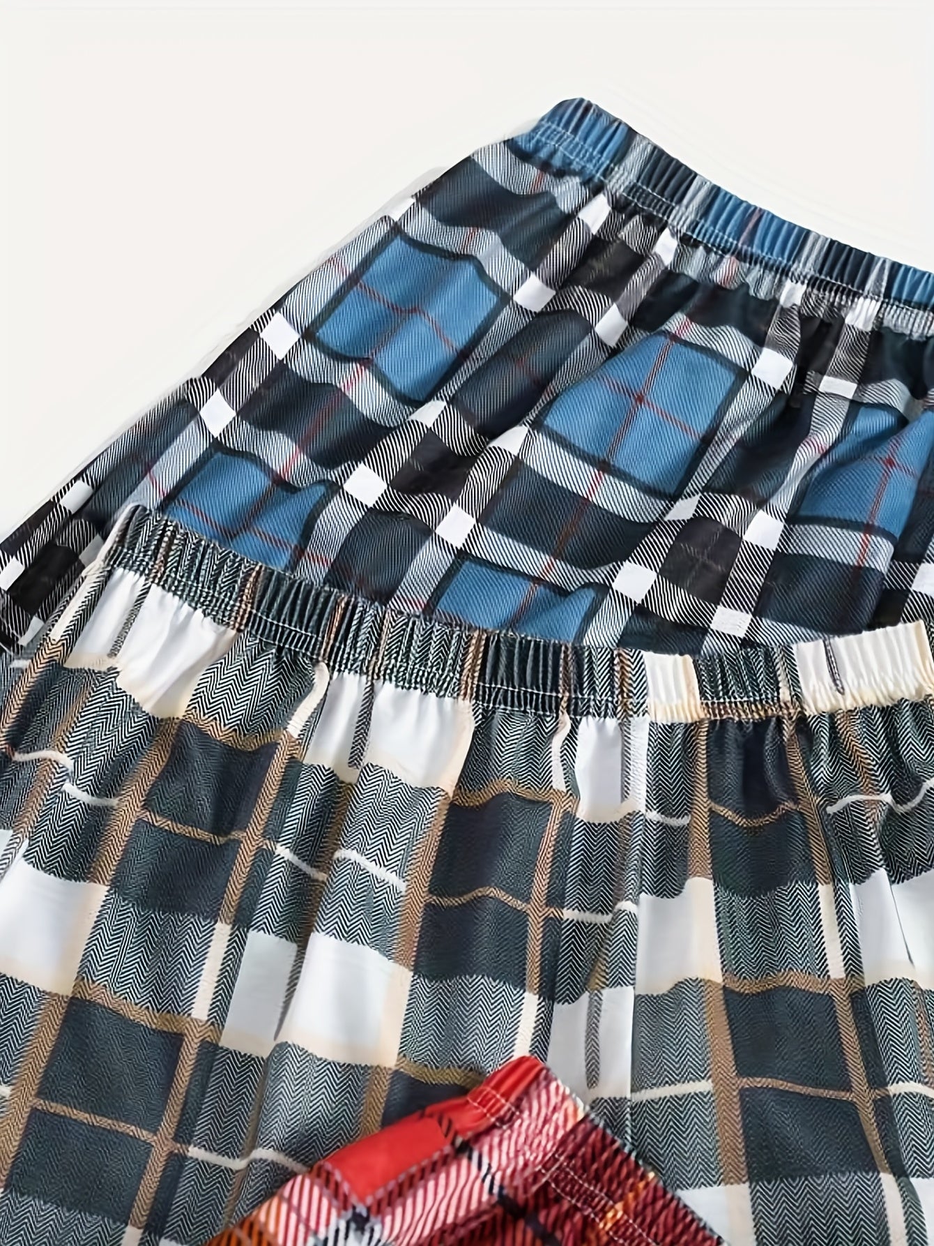 4 plaid print lounge shorts with elastic waist for women's sleepwear and loungewear.