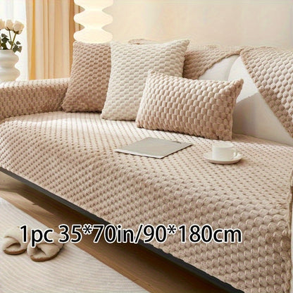 Non-slip sofa cover with honeycomb pattern, ideal for all seasons and protecting furniture in any room.