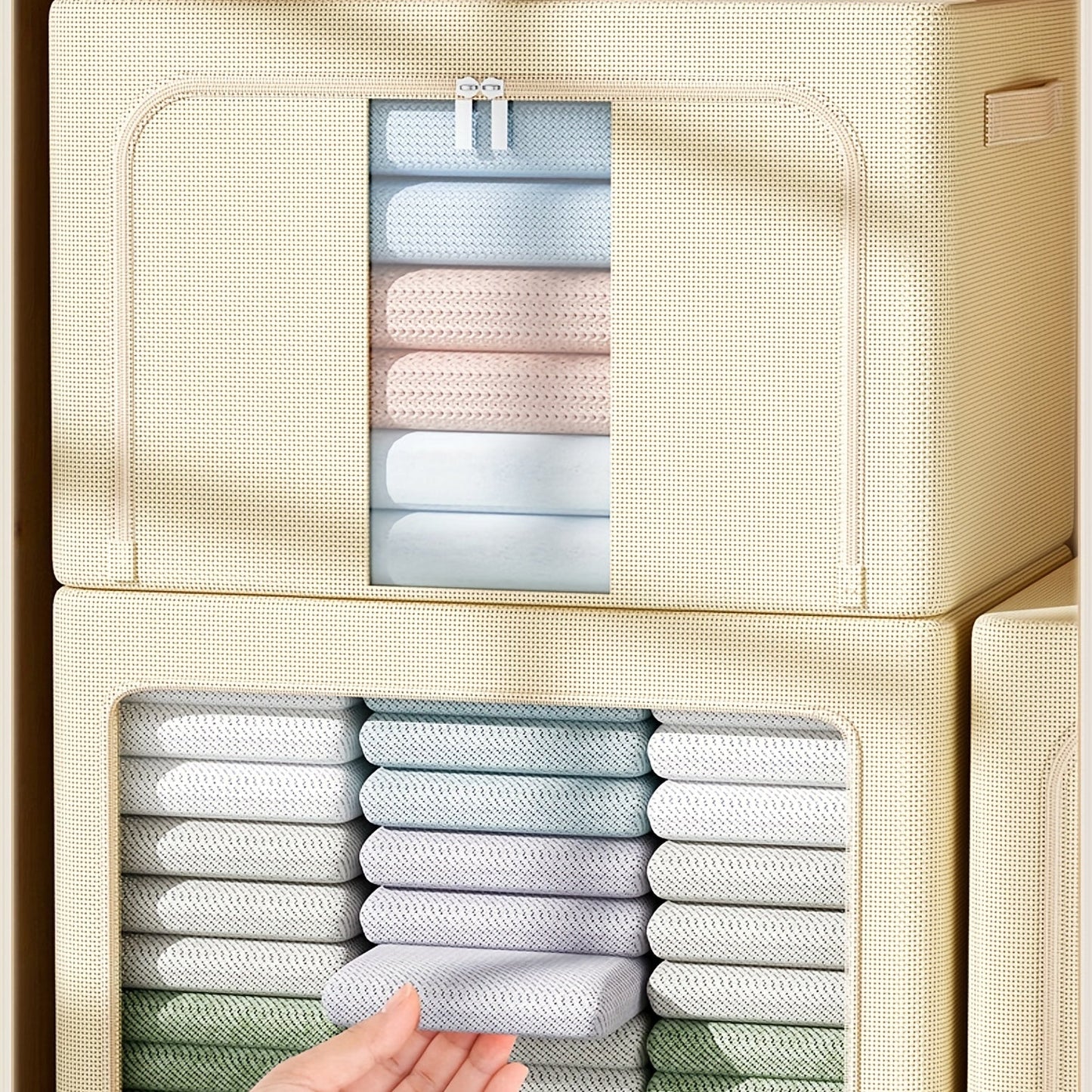 Three pieces of clothes storage boxes made with Oxford fabric, featuring a clear window for easy viewing. These foldable and stackable containers are perfect for organizing your wardrobe, with a total capacity of 66 liters.