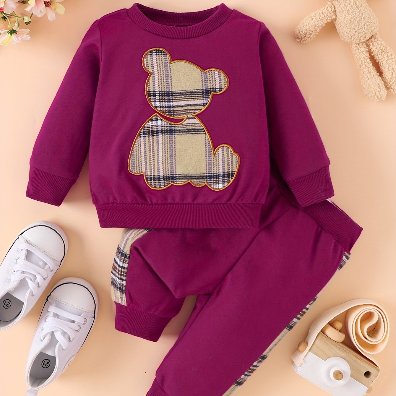 Toddler boy's outdoor fall/winter outfit with long sleeve sweatshirt and casual pants.