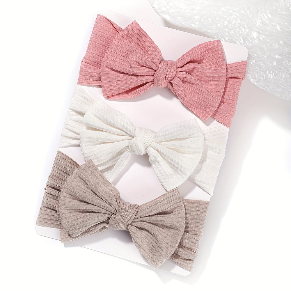 3 soft and stretchy bow hairbands for girls made of comfortable polyester, ideal for hairstyling