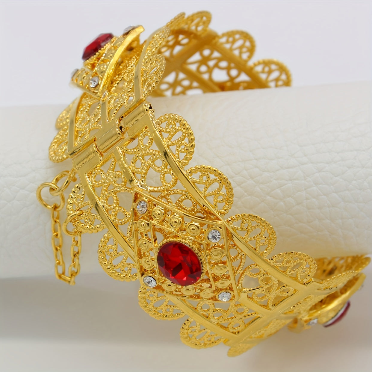 Elegant Arabian-inspired 18K Gold Plated Hollow-Out Cuff Bangle adorned with Synthetic Cubic Zirconia - Adjustable Open Bracelet perfect for Women, suitable for both everyday wear and special occasions like weddings.