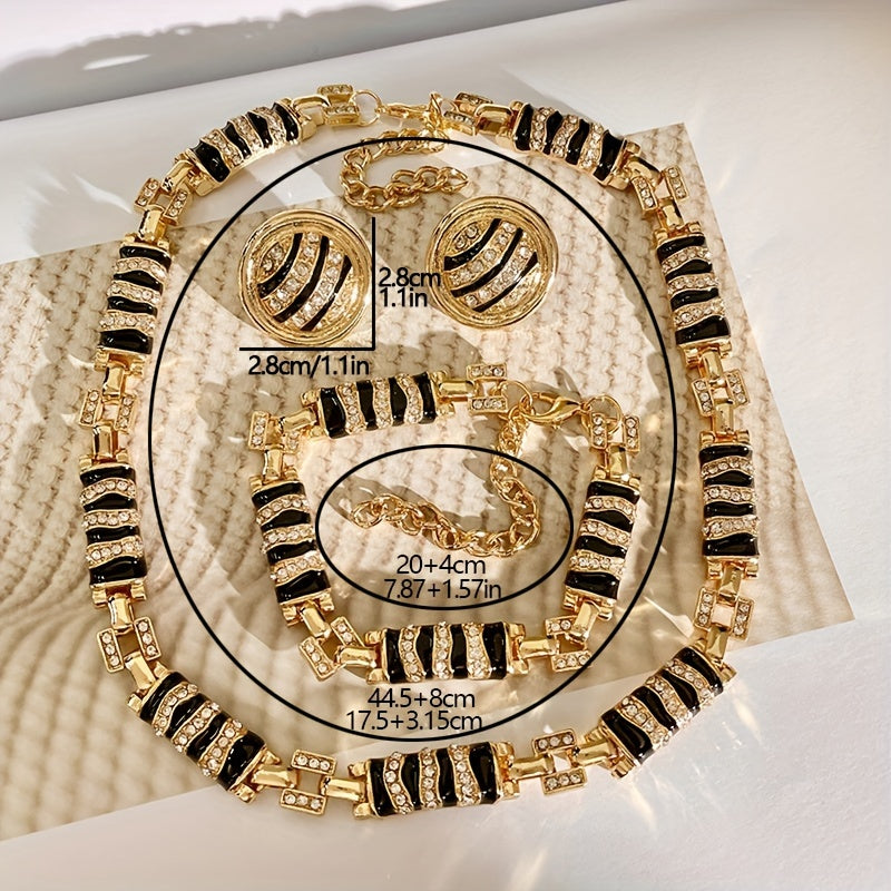 Chic and Stylish French-Inspired Zebra Print Jewelry Set - Featuring Vintage Geometric Design in Gold Plated Enamel with Sparkling Rhinestone Details. Complete with Necklace, Bracelet, and Earrings; Ideal for Everyday Wear, Events, and Celebrations.