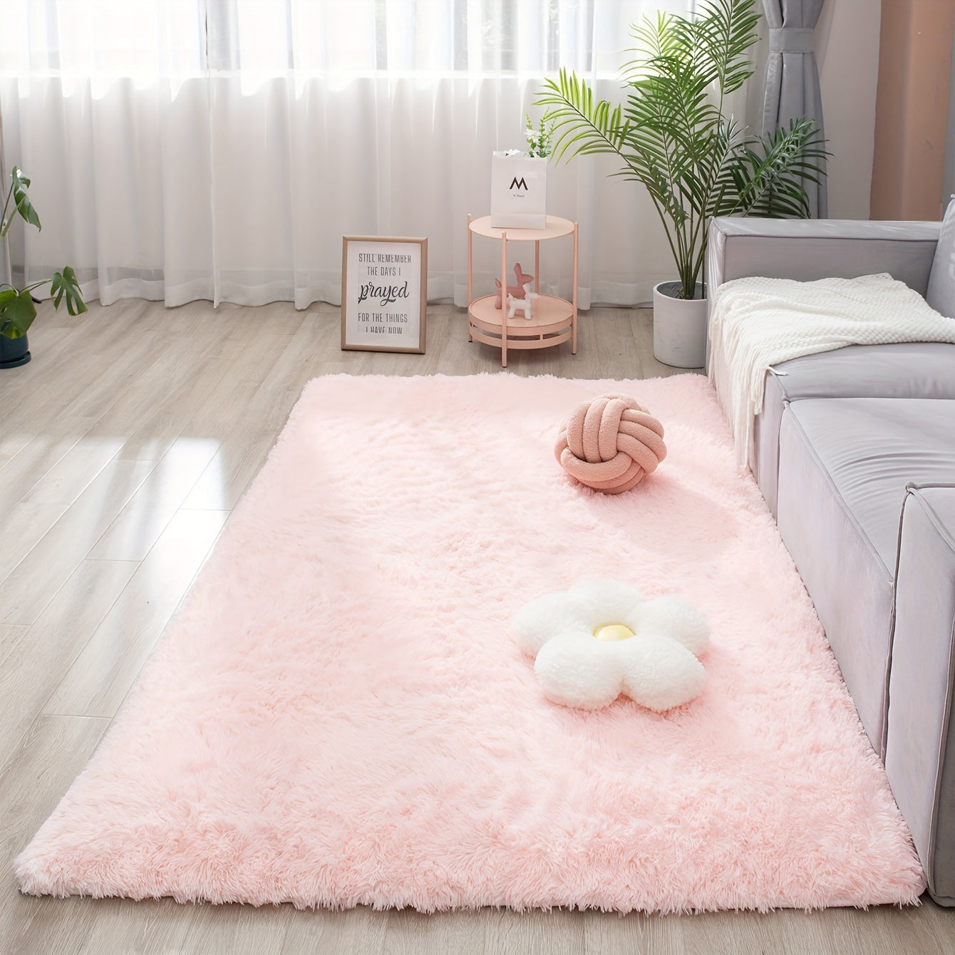 Soft and fluffy rectangle area rug perfect for your bedroom. This plush carpet is thick and non-slip, making it ideal for your living room. Made with machine-made polyester fiber, this low-pile rug is washable for easy cleaning. Perfect for indoor use.