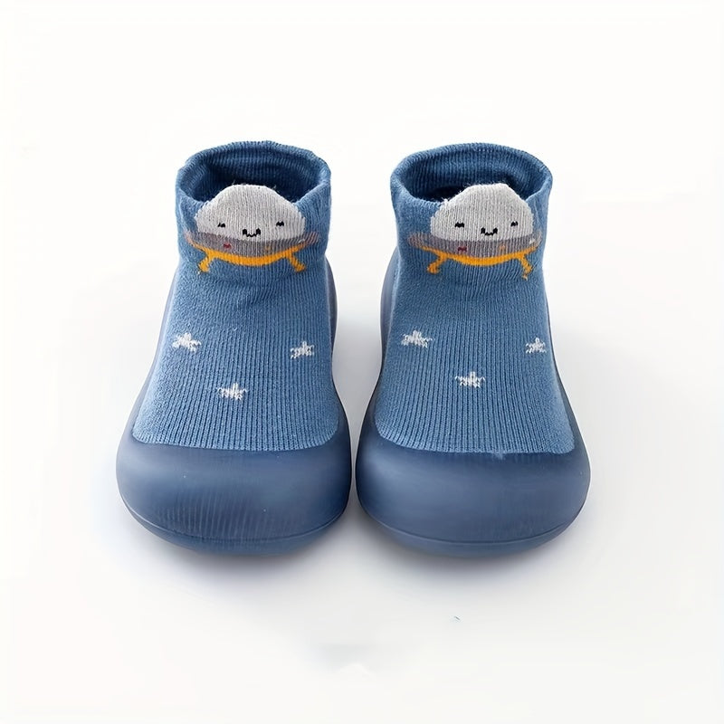 Cute lion cartoon slip-on sock shoes for baby boys in light blue with yellow accents. Soft, breathable, and non-slip rubber sole, perfect for first walkers in spring and fall.