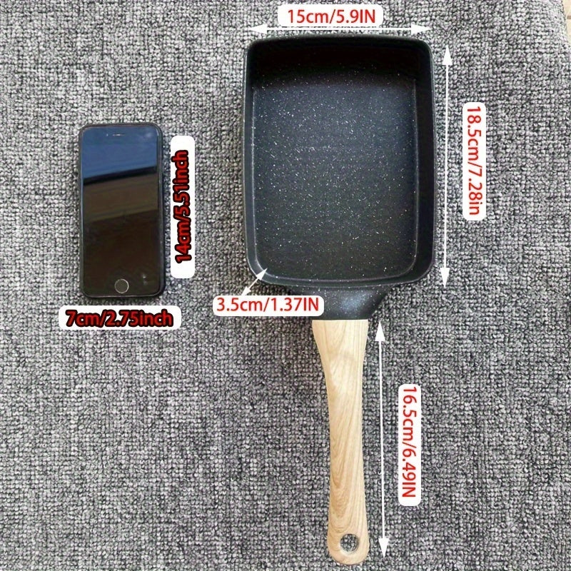 Tamagoyaki Pan: Black square pan for making Japanese omelettes, measuring 14.99 x 18.49cm. Features a non-stick surface, wood handle, and rectangle shape for easy egg rolls and frying. Perfect addition to your kitchenware collection.