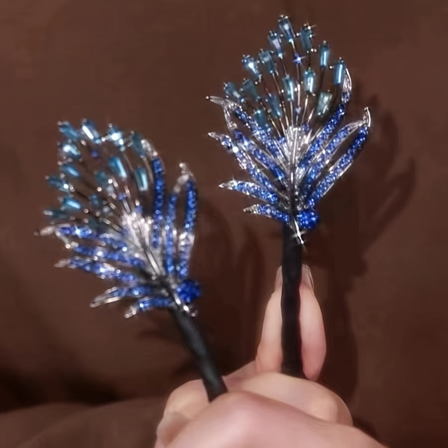 Feathered twist hair clip adorned with rhinestones