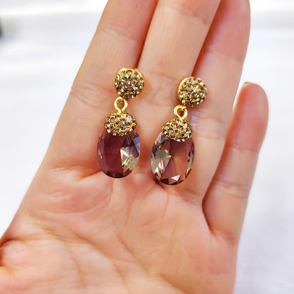 These Sultanite Diaspore Earrings are perfect for weddings, parties, and daily wear. The color-changing stones shift with different lighting, creating a dynamic and eye-catching look.