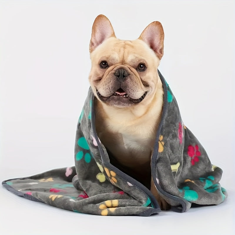 Soft and stain-resistant fleece pet blanket with bone pattern for all sizes of dogs and cats.