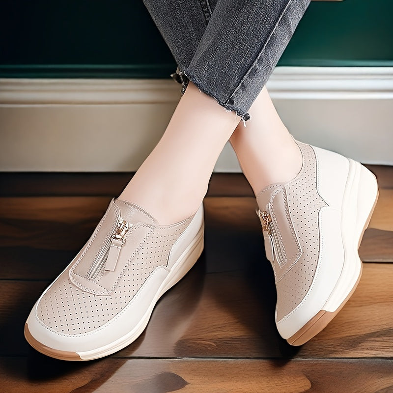 Beige perforated women's casual sneakers with zipper detail, thick sole, and anti-slip features.