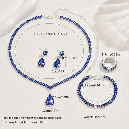 This sophisticated jewelry set features synthetic rhinestones set in silver-plated copper. Included in the set are a necklace, bracelet, earrings, and ring, perfect for weddings and parties. This stunning collection also makes a great Thanksgiving gift.