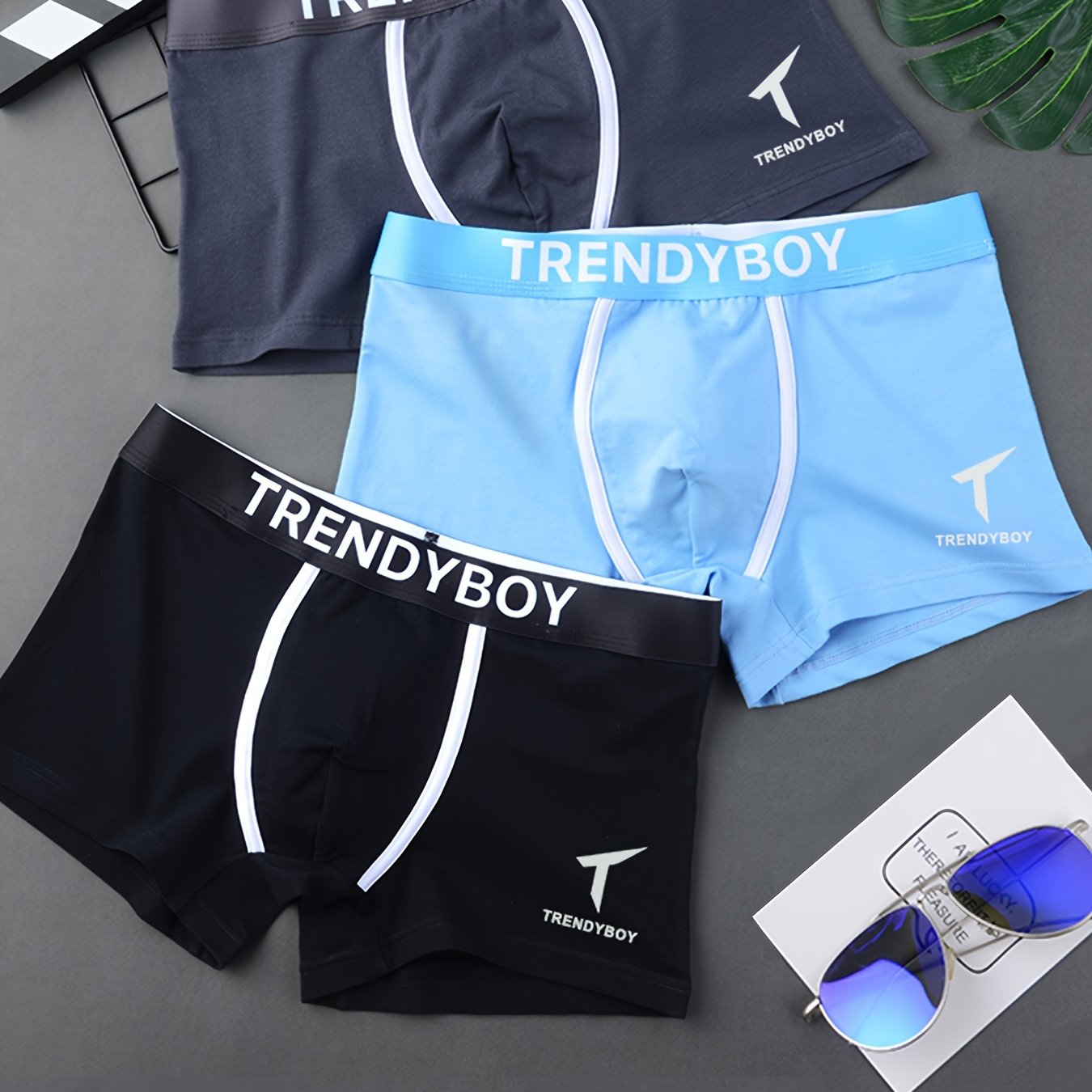 3 TRENDYBOY Men's Boxer Briefs: Soft & breathable polyester blend with comfort fit, elastic waistband, and sleek geometric pattern design for home & sports wear.