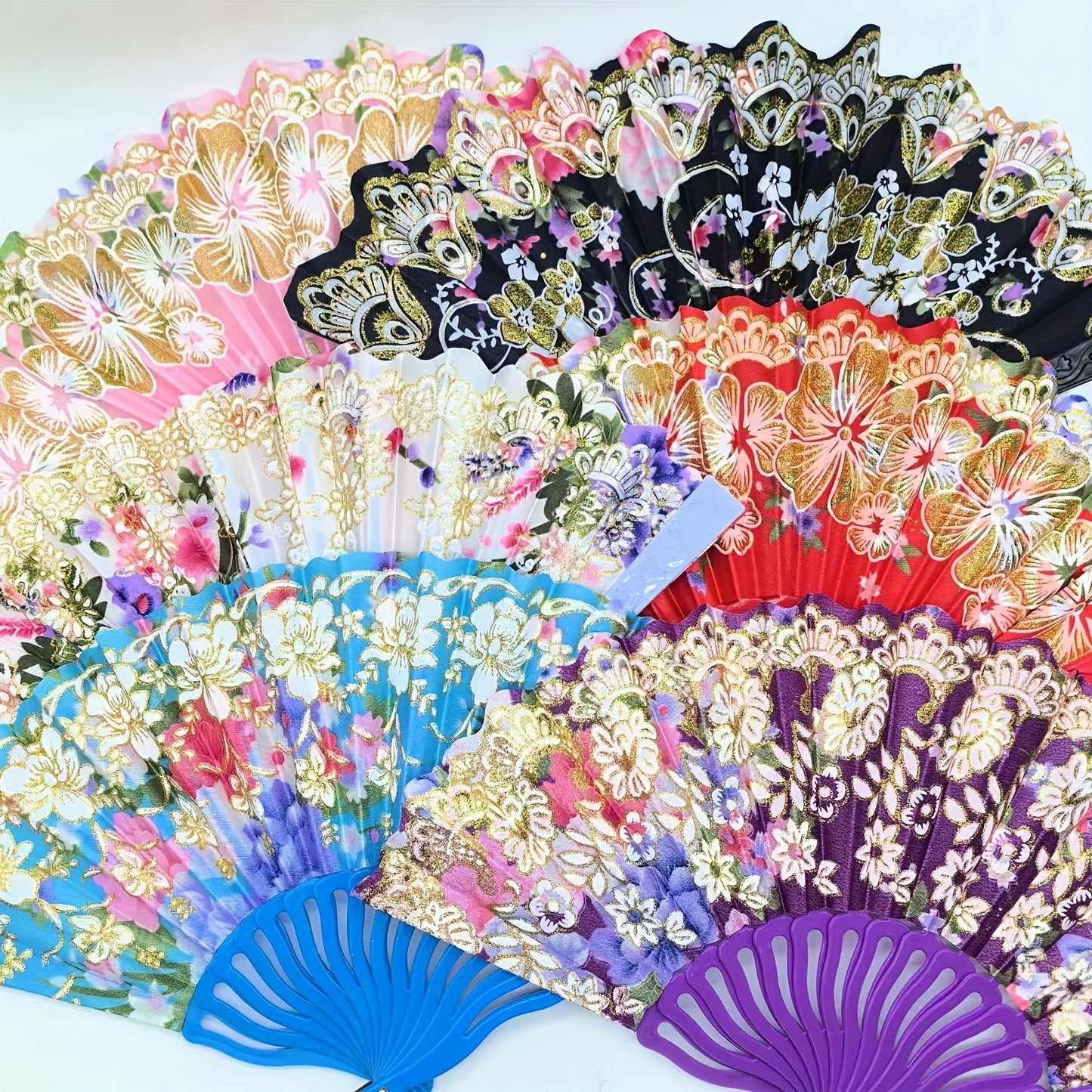 Beautiful Floral Fan Collection - Set of 12/6 Portable Folding Fans made with Linen Fabric & Plastic, adorned with Golden Glitter details and featuring a variety of Patterns