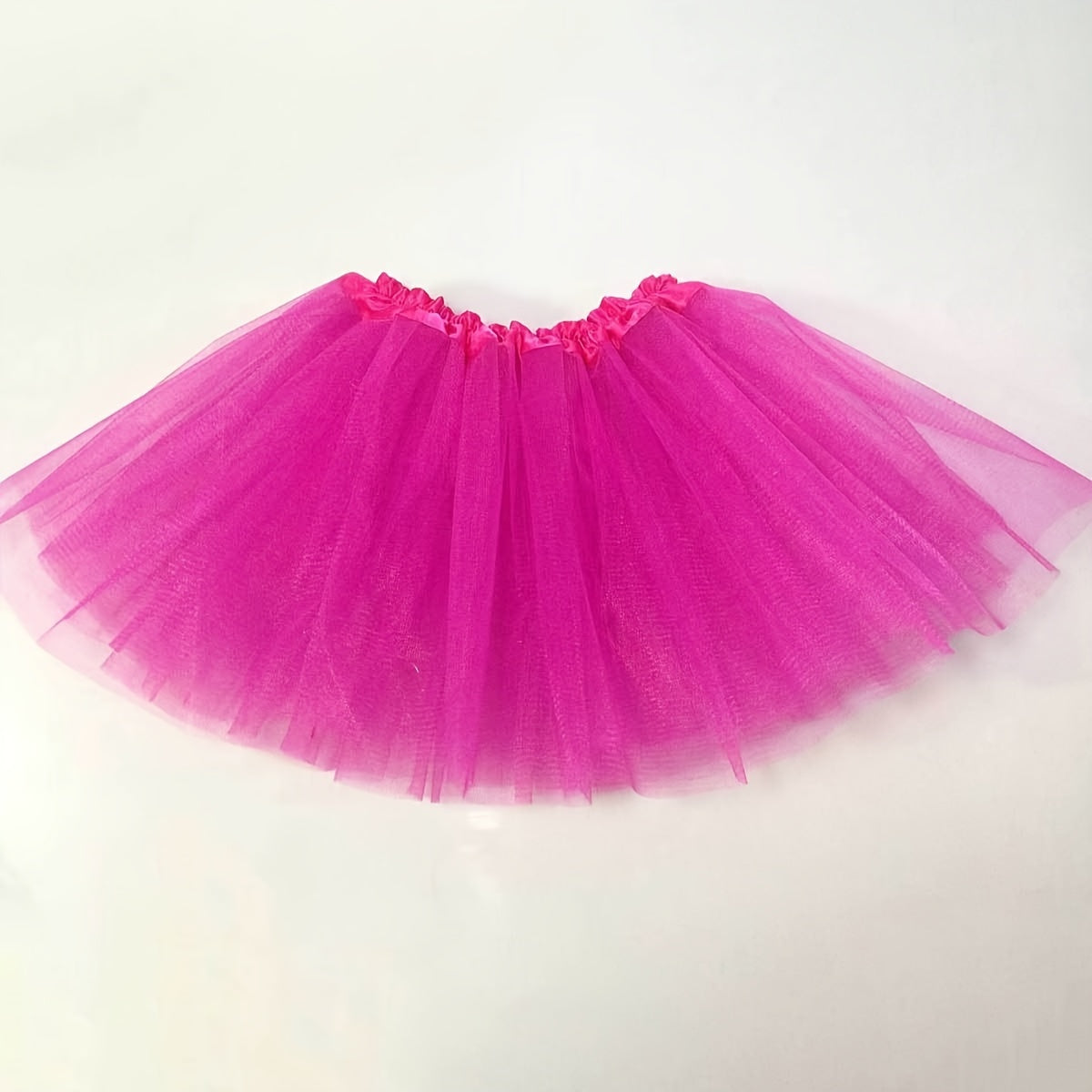 A three-tiered Princess Tutu birthday party dress for adults for a cosplay dance party.