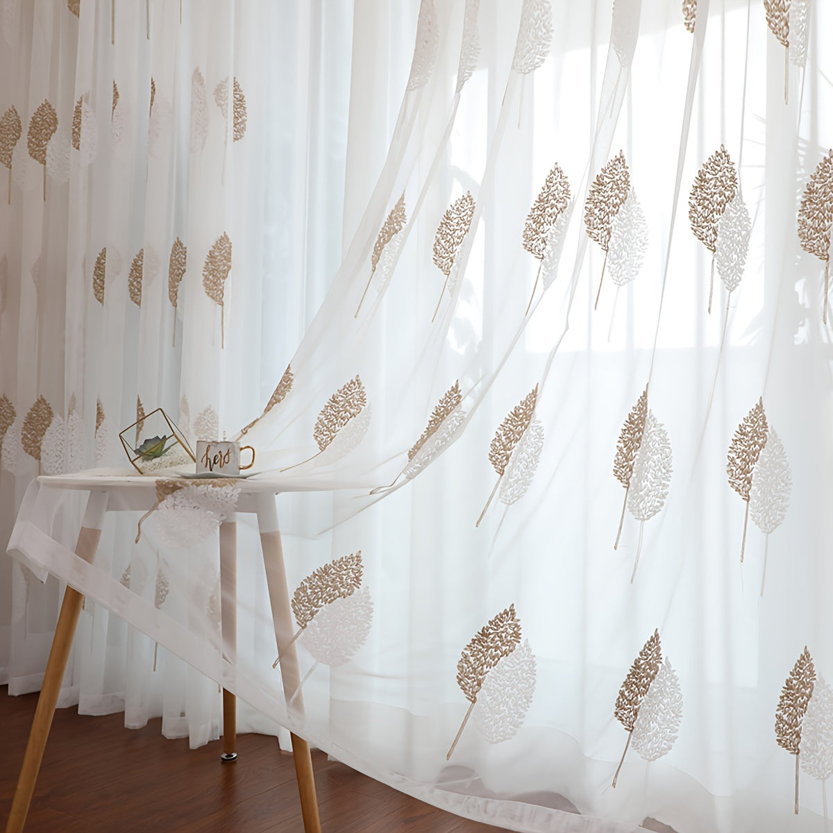 Add a touch of pastoral elegance to your home with this beautiful sheer curtain featuring delicate leaf embroidery. This translucent tulle curtain is easy to hang with a rod pocket design, perfect for adding a subtle touch of style to your living room or