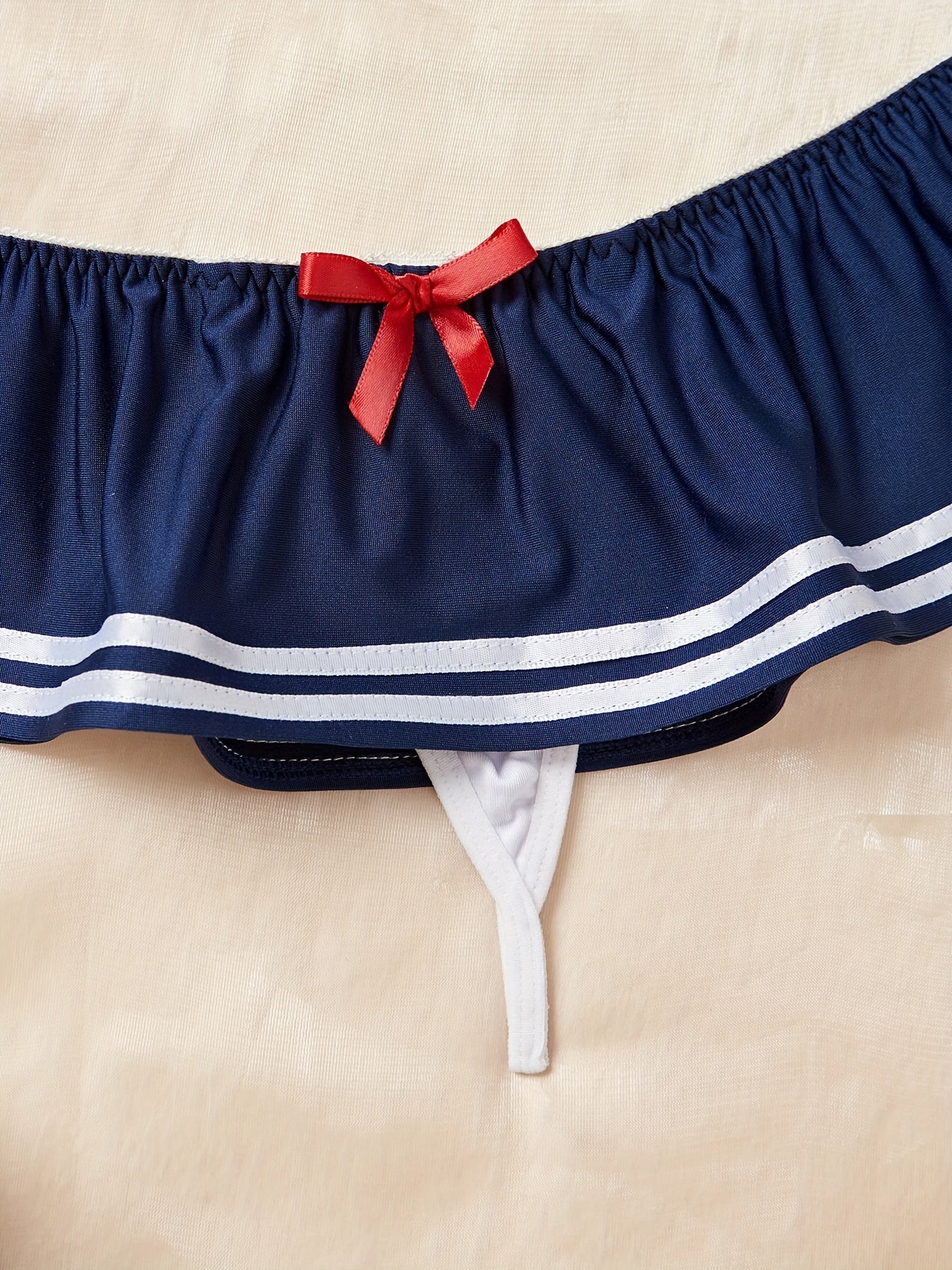 2-piece lingerie set with nautical look, ruffle detailing and bow accents for women