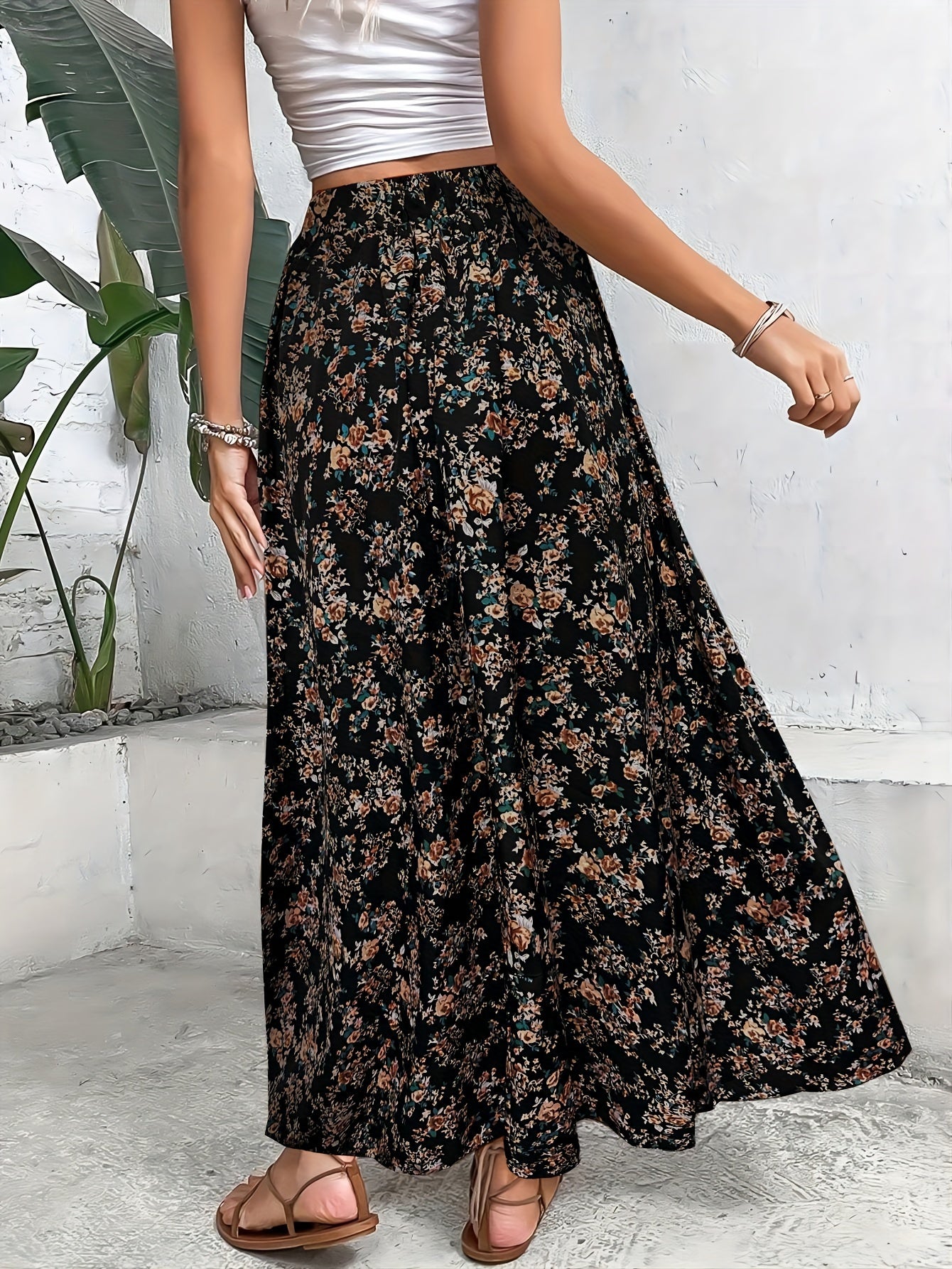 Bohemian style long skirt with small floral design and elastic waist.