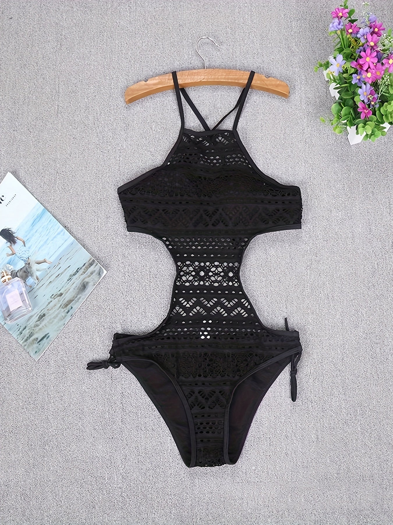 Stylish lace one-piece swimsuit with cutout design, removable pads, stretch fabric, and machine washable.