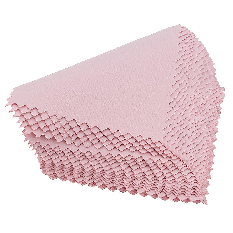 Pack of 50 Pink Jewelry Polishing Cloths made from ultra-fine microfiber to clean silver items. These non-textile polyester cloths do not contain any chemicals and are designed to shine and polish silverware.