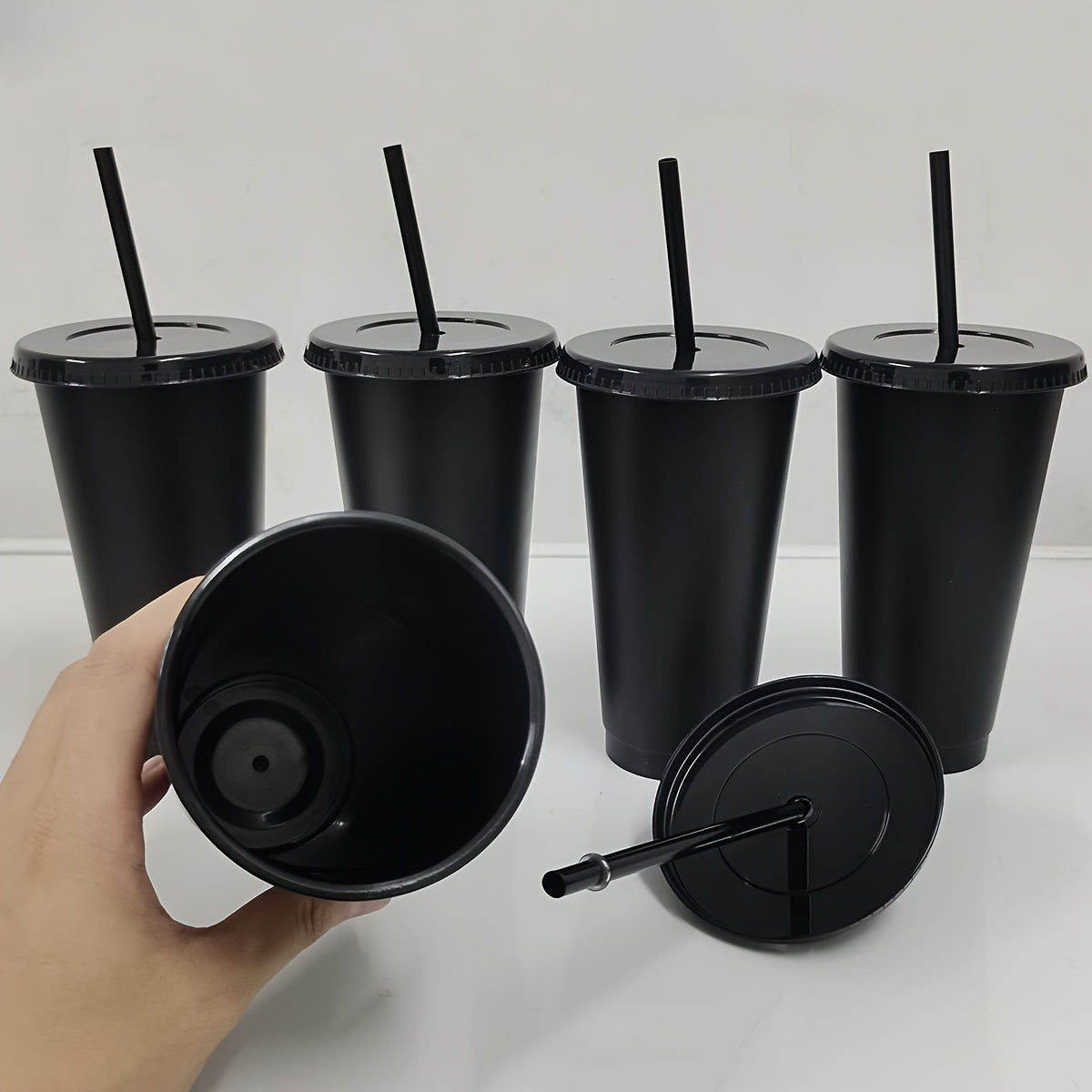 10 piece set of leak-proof 24oz reusable plastic tumblers with lids and straws. Ideal for various occasions like baseball games, parties, and holidays. Free of PVC. Great for Christmas, Halloween, Graduation, Juneteenth, and Labor Day.