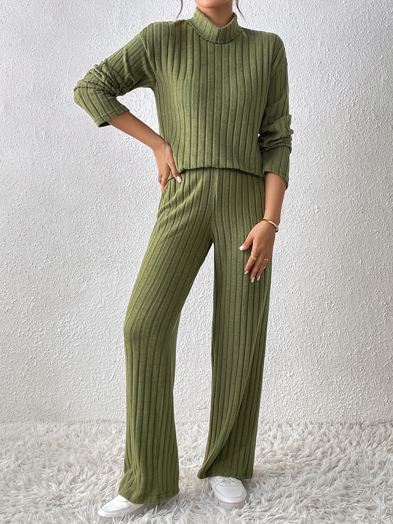 Fur-trimmed casual suit with high collar, solid long sleeve top, and loose trousers two-piece set for women.