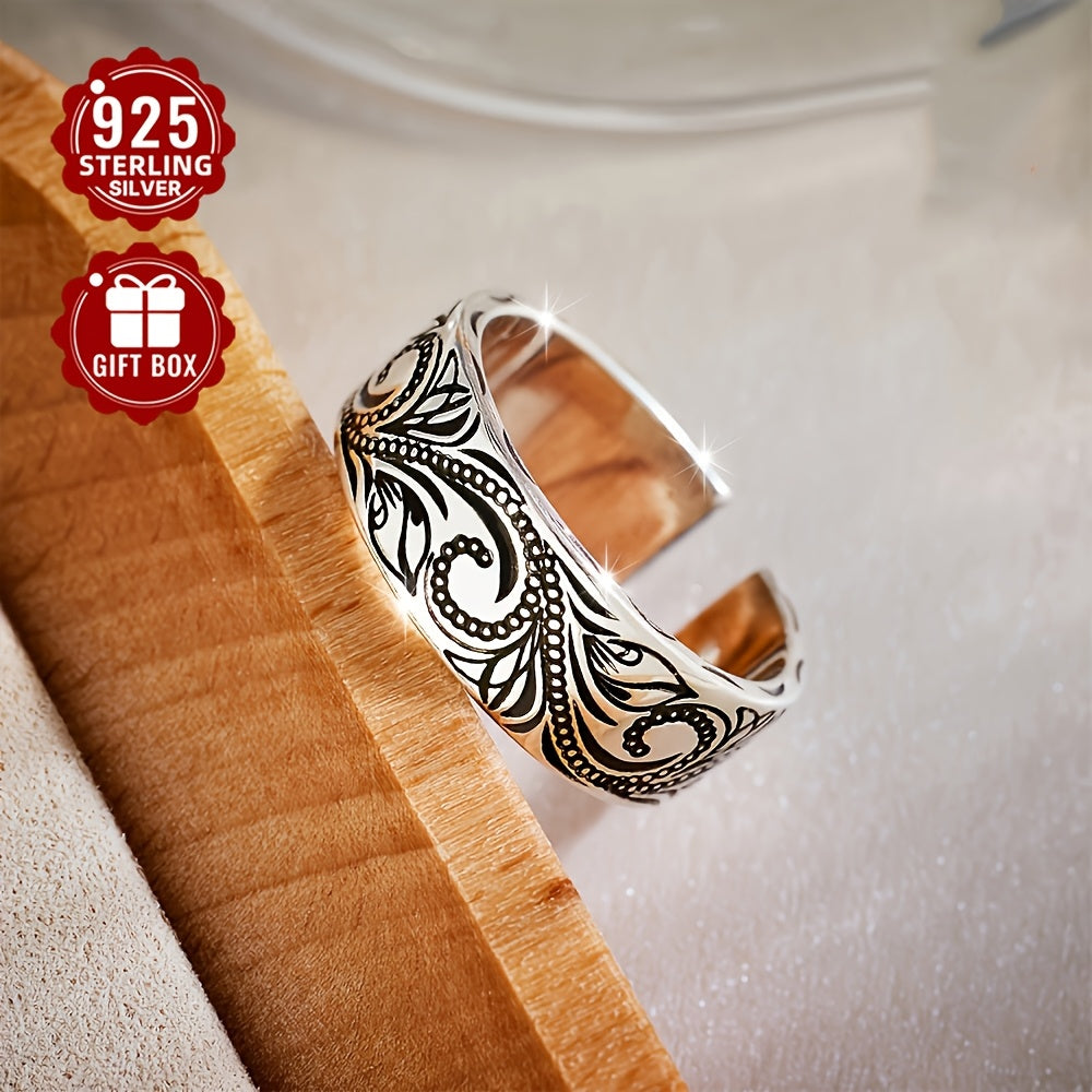 This elegant Bohemian-style 925 sterling silver ring features an adjustable fit and intricate paisley design. Ideal for both men and women, it is perfect for daily wear or special occasions. Weighing 5.5g, this ring is adorned with a leaf flower motif