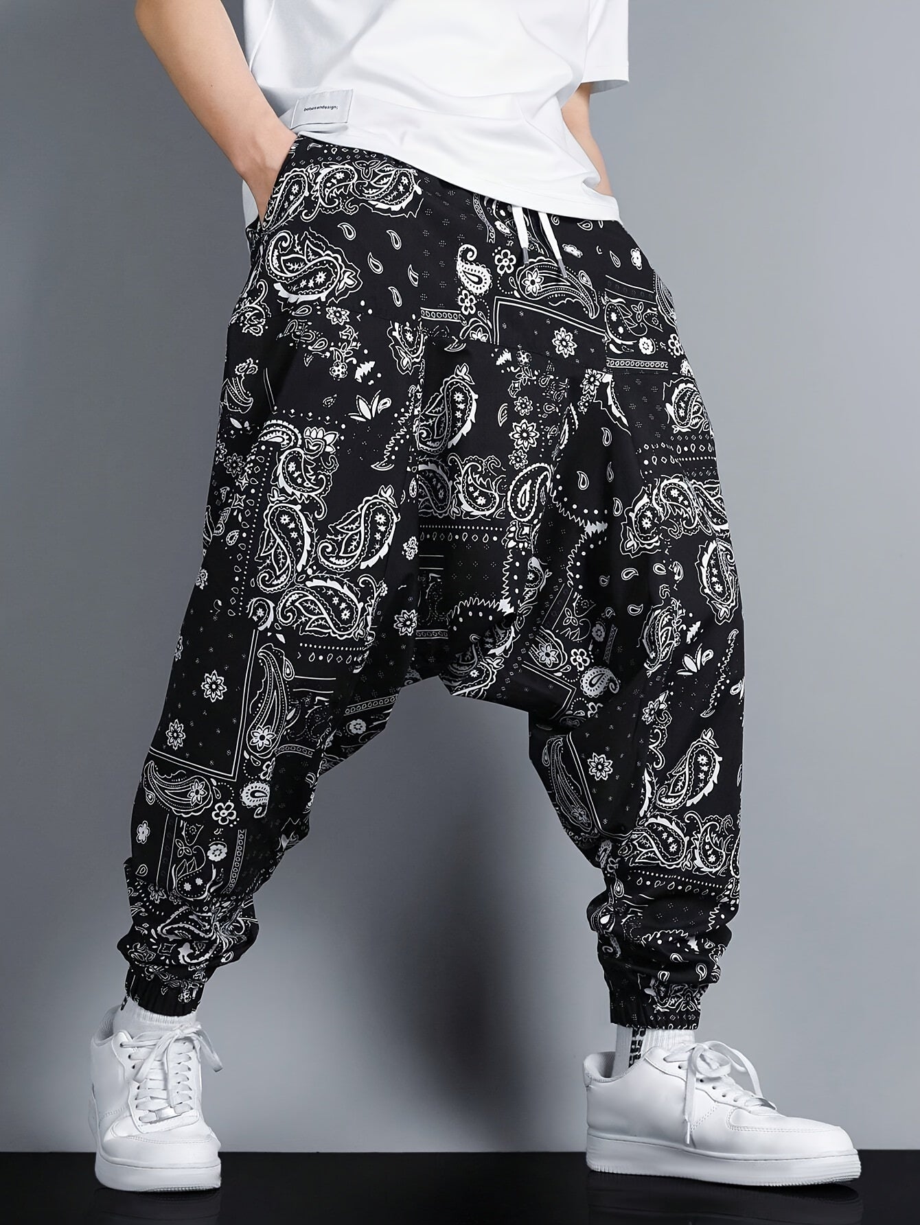 Men's oversized joggers featuring paisley pattern print.