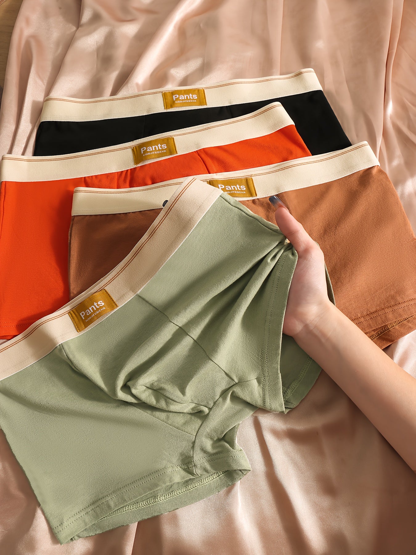 Men's 8-pack Solid Color Boxer Briefs crafted from comfy cotton for breathability.