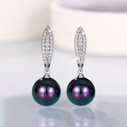 These stunning imitation pearl earrings are adorned with delicate micro-paved zirconia, adding an elegant touch. Ideal for weddings, parties, anniversaries, or as a thoughtful gift for any occasion.