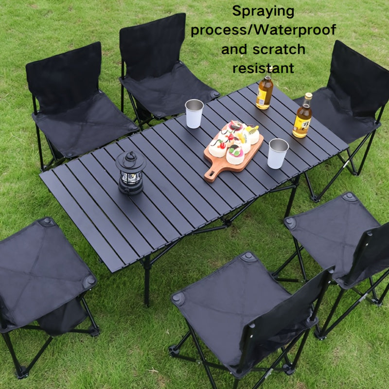 Carbon steel outdoor folding table with storage bag for easy carrying and quick installation, ideal for camping, fishing, parties, barbecues, and garden use.