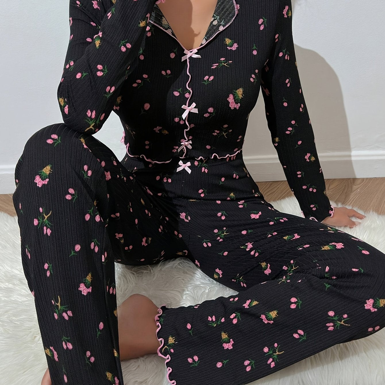 Floral print pajama set with bow detail, long sleeve top and ribbed pants in soft polyester blend - ideal for autumn nights