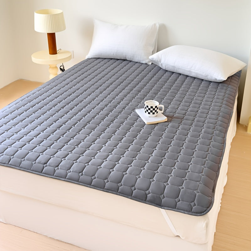 Waterproof mattress topper with machine washable quilted polyester cover, polyurethane liner, and non-slip design for dormitory and home use. 1-piece.