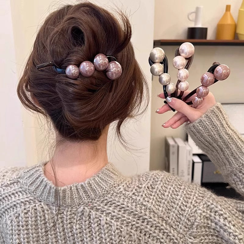 Stylish imitation pearl twist hairpin for daily wear and styling.